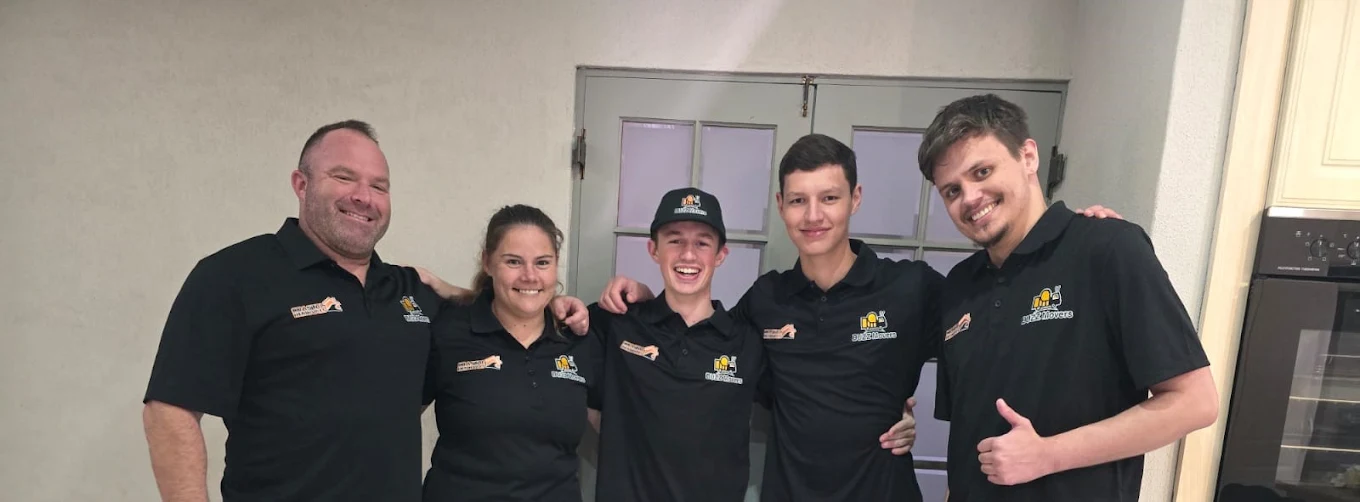 The Buzz Movers team in branded shirts